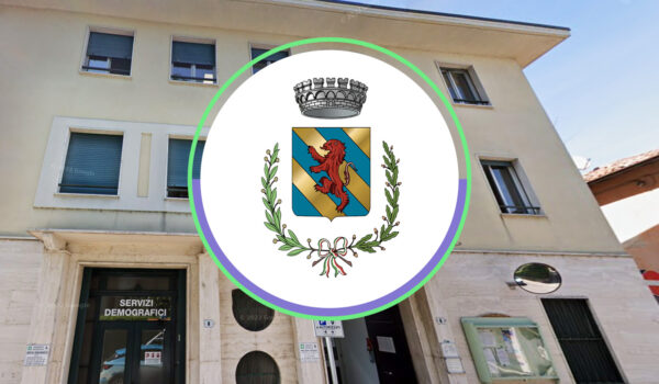 Stemma comunale di Missaglia e municipio di sfondo.